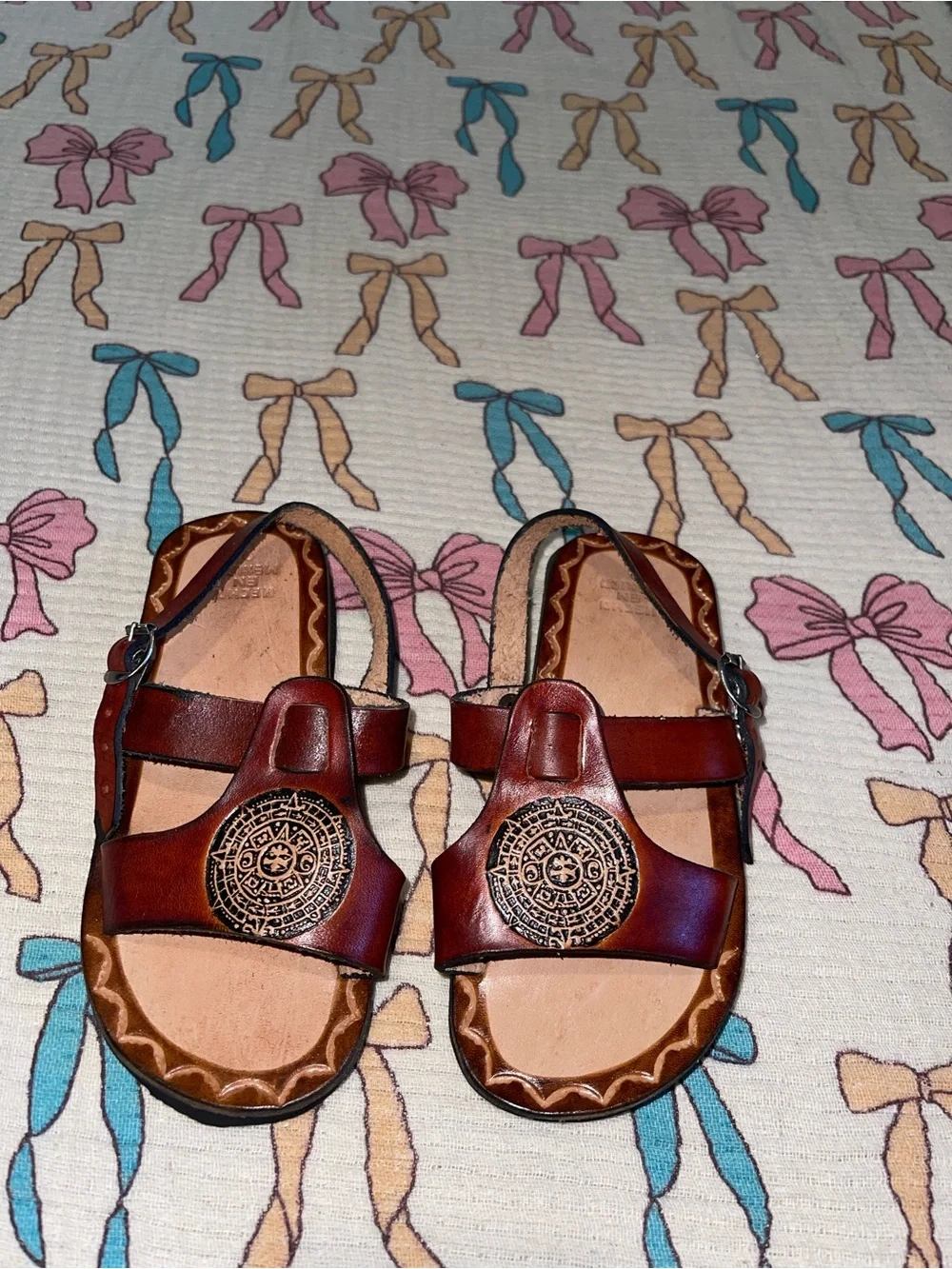 Vintage Brown Leather Kids Sandals with Decorative Medallion